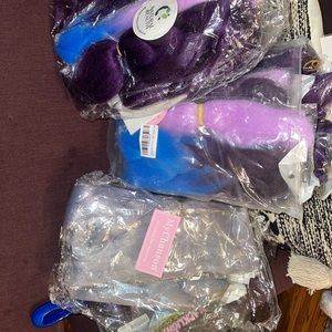 3 bags of artificial hair; blue, purple, and silver